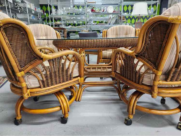 Oval Rattan Glass Top table w/ Four Chairs
