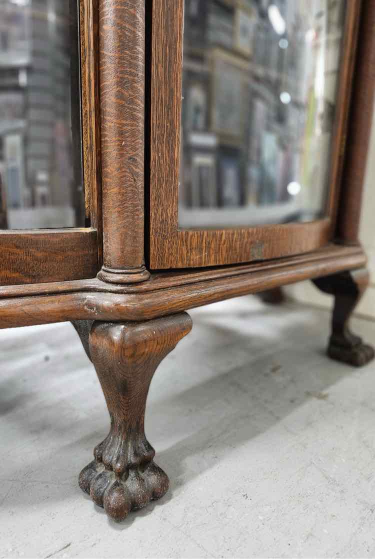 Lion’s Claw Bow Curio Cabinet