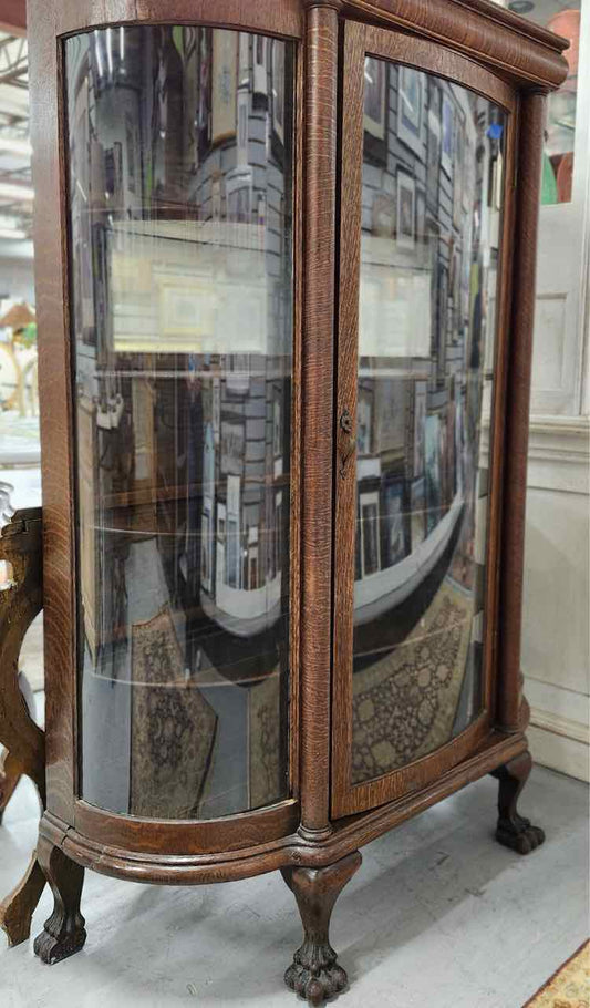 Lion’s Claw Bow Curio Cabinet