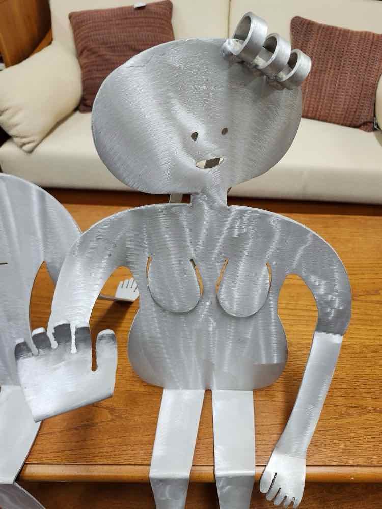 Sitting Metal Female Art Sculpture by Fred Garboiz