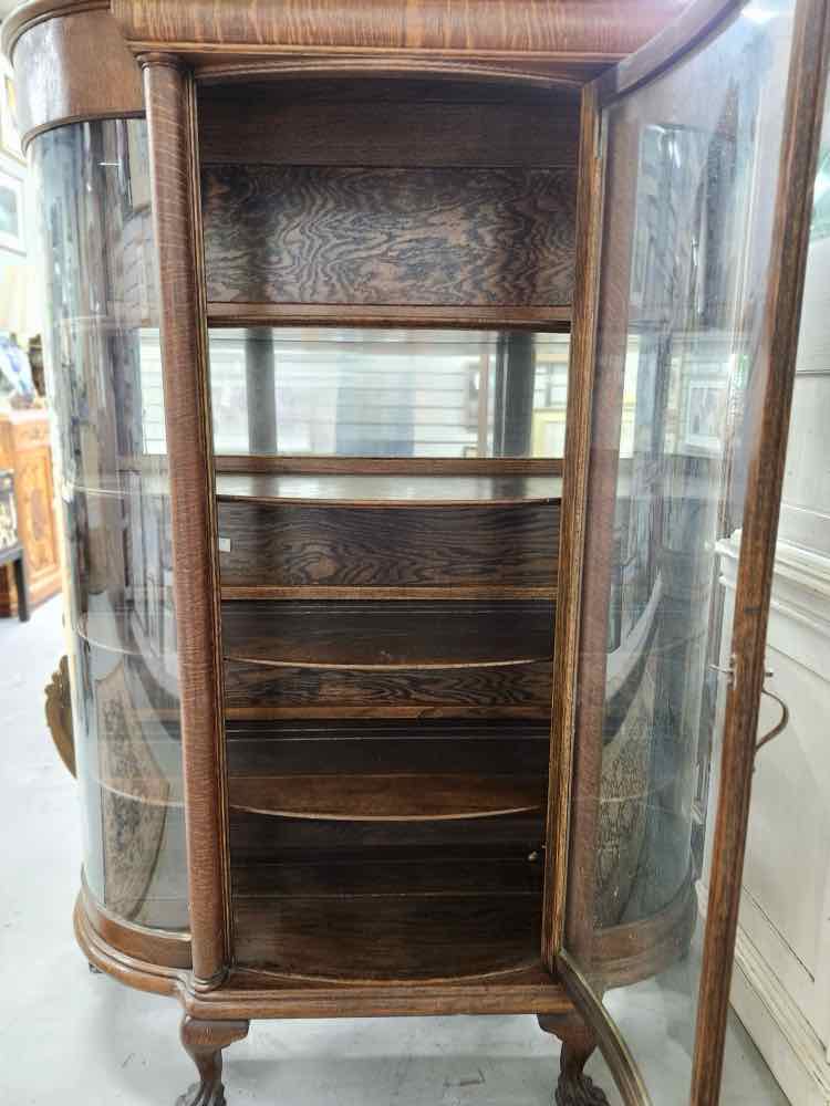 Lion’s Claw Bow Curio Cabinet
