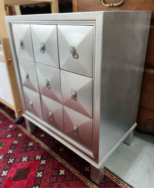 Silver 9 Drawer Lion Pull Cabinet