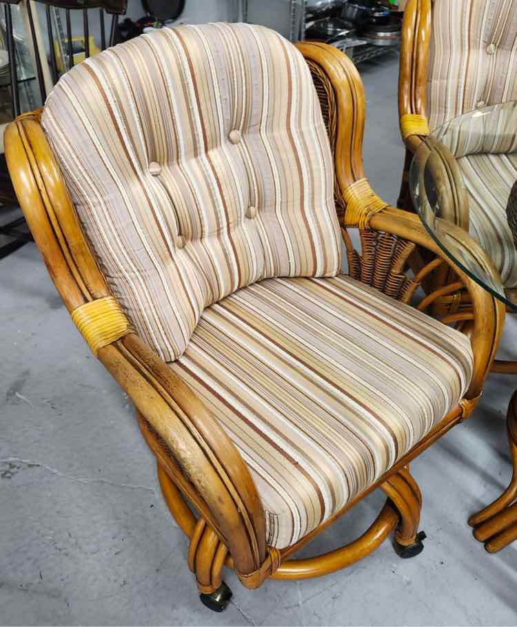 Oval Rattan Glass Top table w/ Four Chairs
