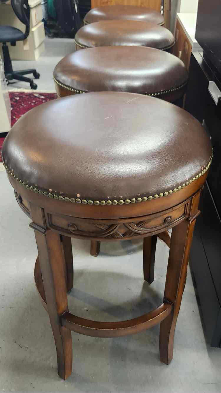 Four Ballard Design Leather Top Bar Swivel Stools